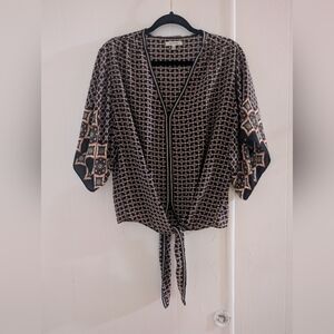 Elegant Black and Cream Patterned Blouse